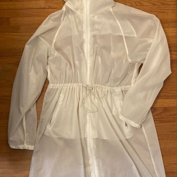 This is The Constant White Clear Overcoat - Picture 2 of 3